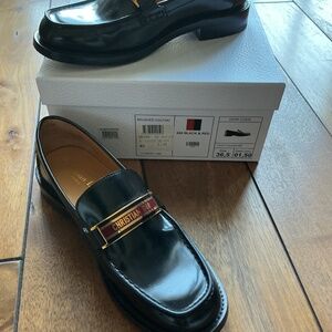 CHRISTIAN DIOR Black Calfskin Code Loafers Red Gold Logo Plaque 36.5